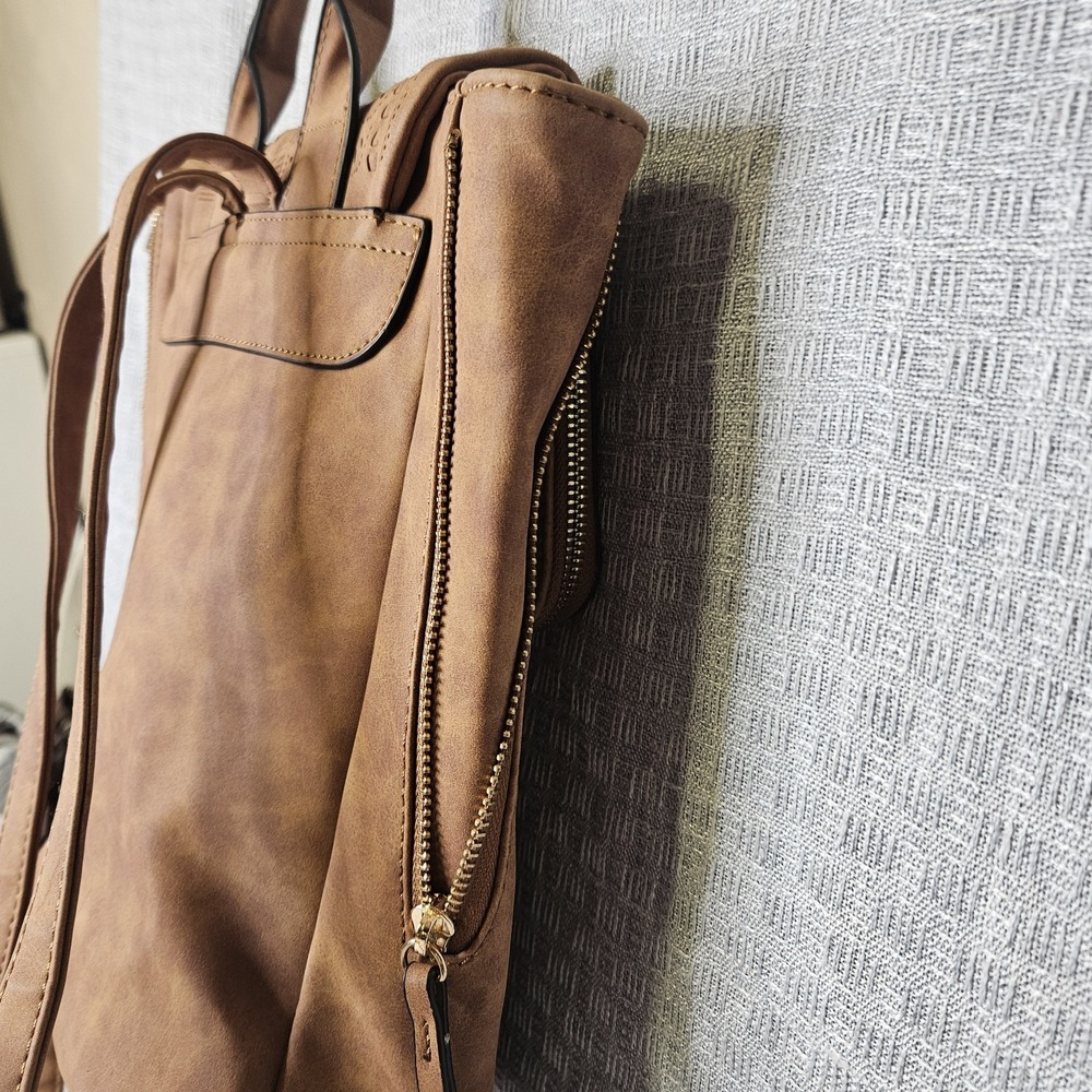 Backpack/ Carry All made from faux leather with a stamped/embossed‎ finish. - Picture 6 of 14